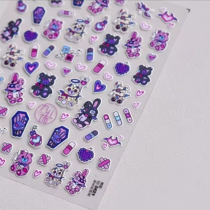 Purple pink dark bunny and teddy nail stickers close-up