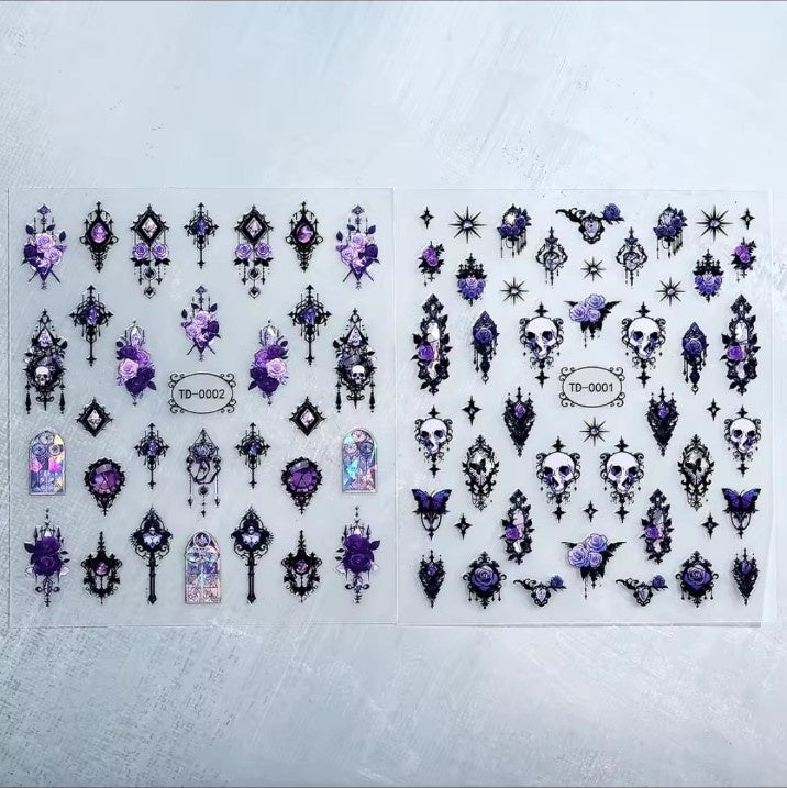 Two sheets of black and purple gothic nail decals