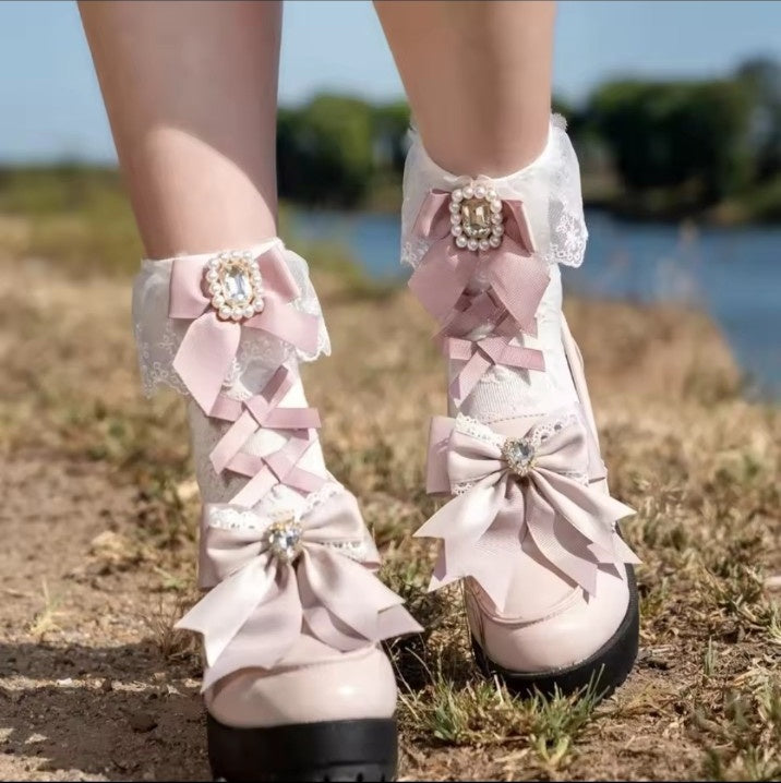 Blush pink and white lolita ankle socks styled with platform shoes