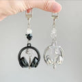 Music headphone keychain in black and silver