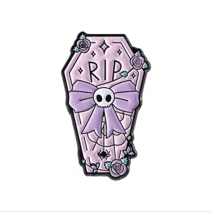 Pastel goth RIP coffin bow enamel brooch