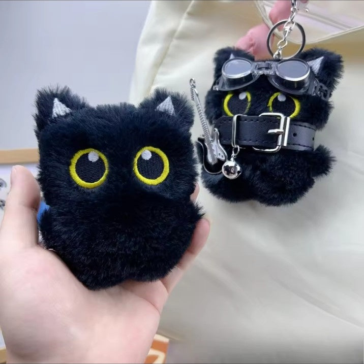 Black plush cat bag charm shown plain and with punk accessories