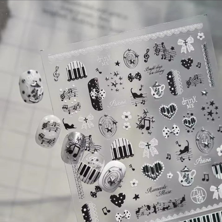 Black and white romantic music nail stickers with piano keys, notes, bows and hearts