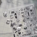 Black and white romantic music nail stickers with piano keys, notes, bows and hearts