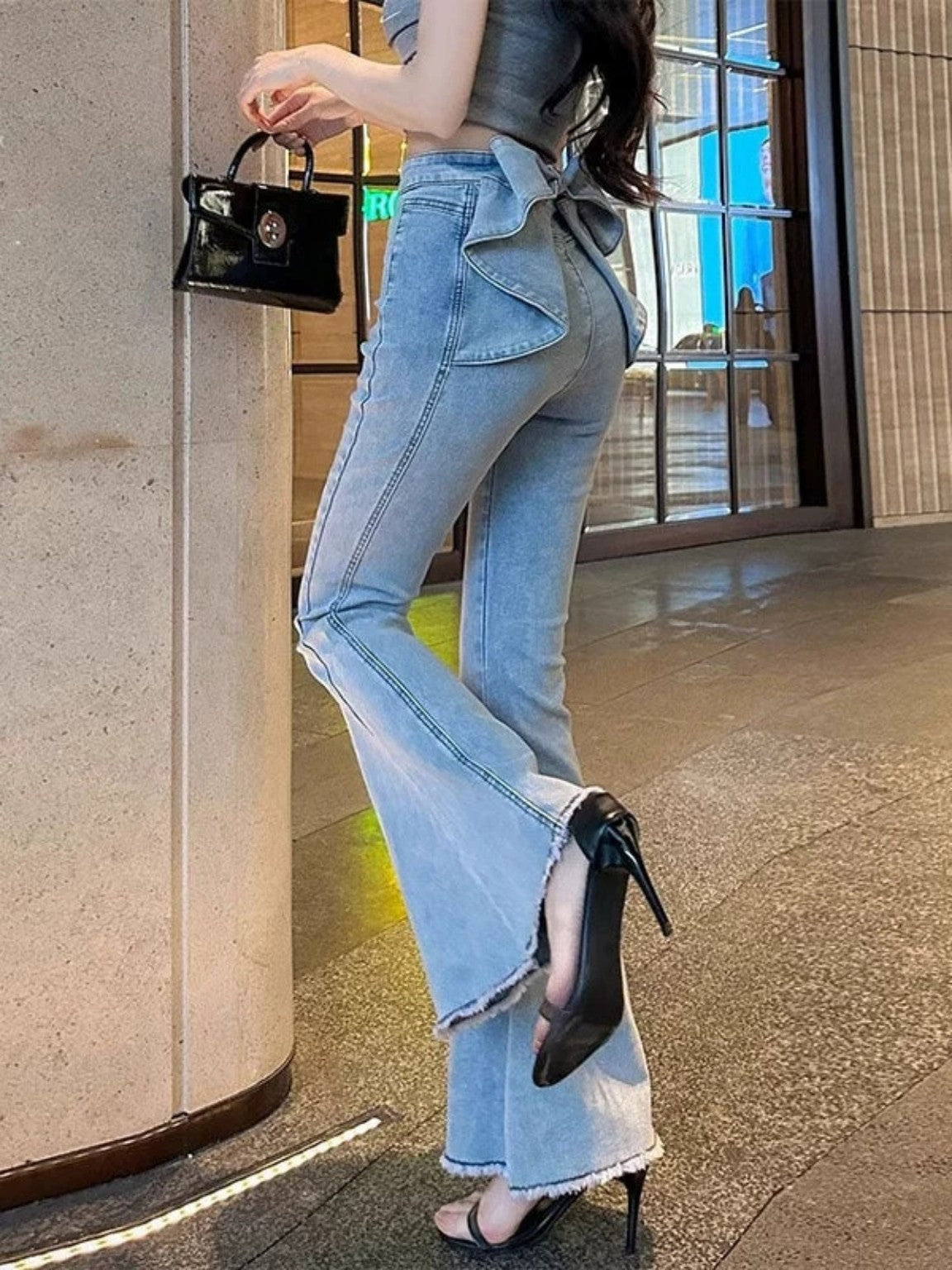 Light wash bow detail flared jeans