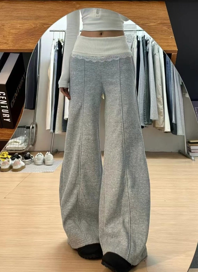 Grey wide leg pants with cream ribbed waistband and lace trim