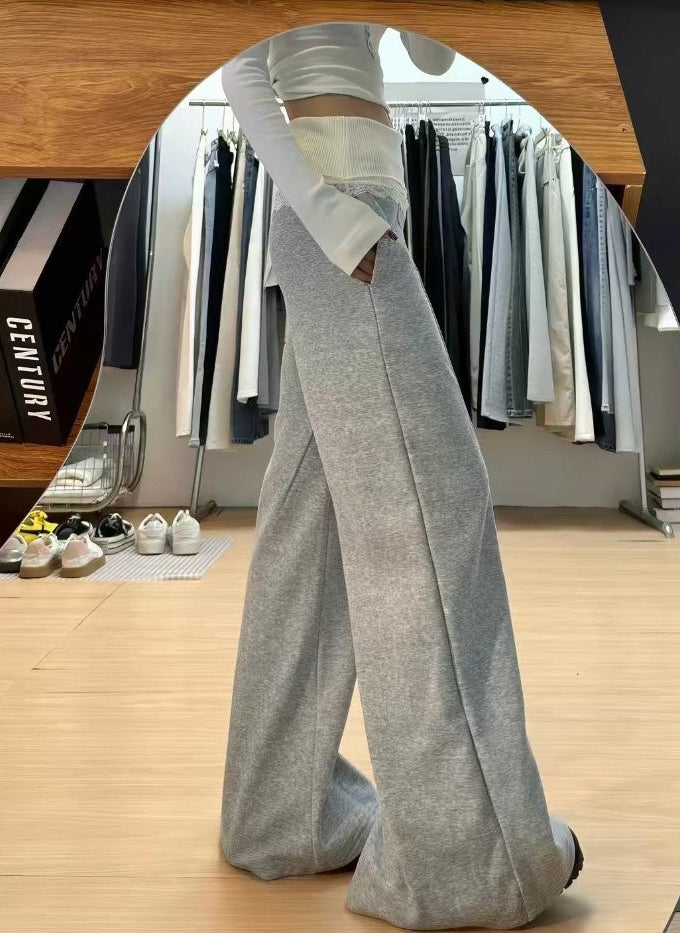Grey floor length wide leg pants side view