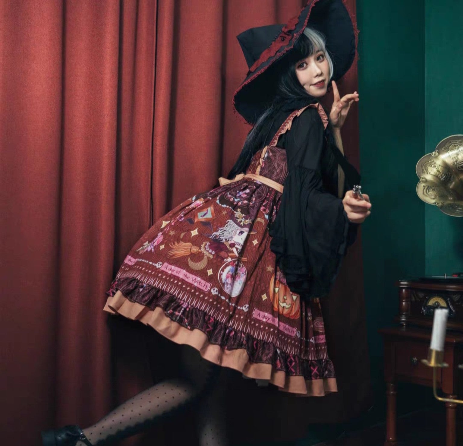 Little witch Lolita dress styled with black blouse and witch hat