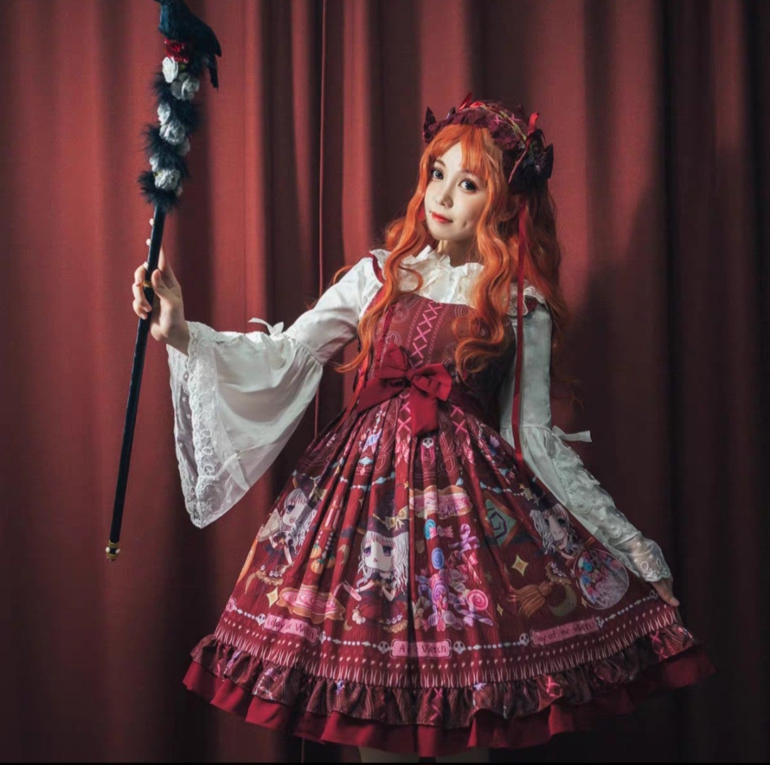 Little witch Lolita dress styled with white blouse and red bows