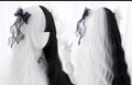 Black and white split long wavy synthetic wig with bangs