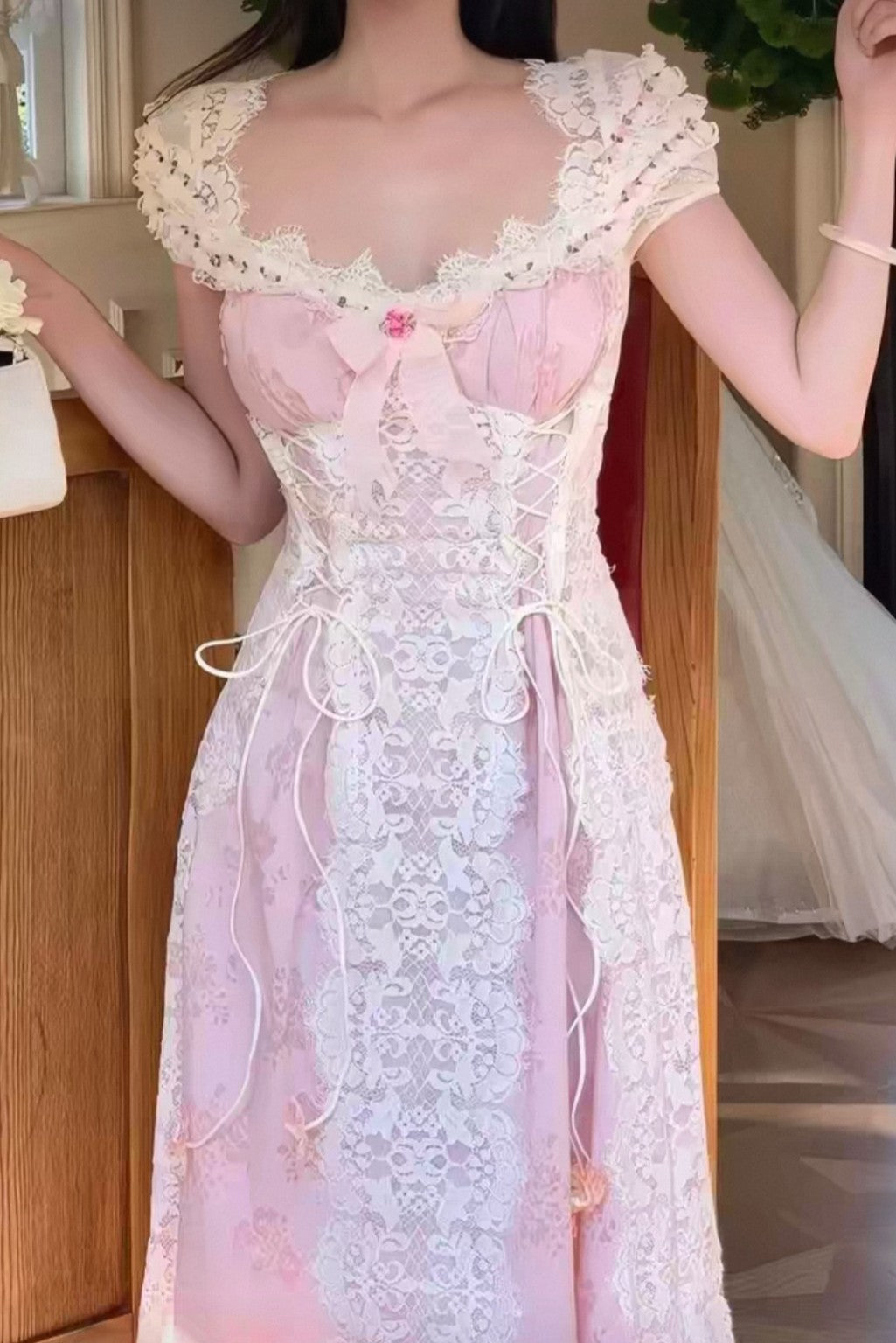 Pink and white lace corset style floral dress front view