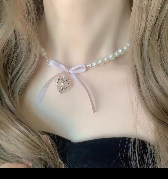 Pink pearl heart choker necklace worn
