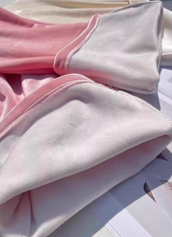Soft velvet lining detail on pink and cream pants