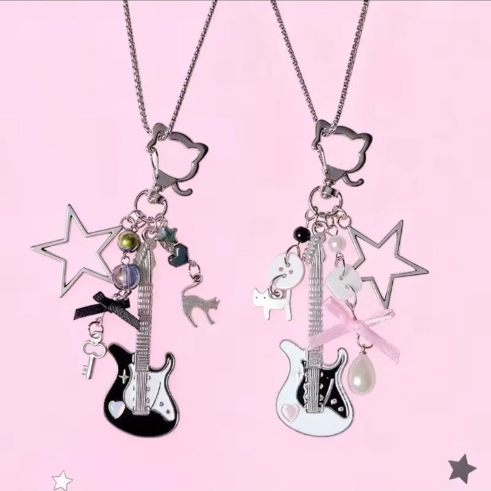 Y2K guitar keychains in black and pink