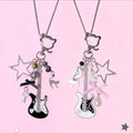 Y2K guitar keychains in black and pink