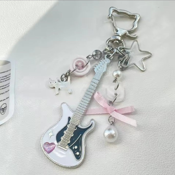 Pink Y2K guitar keychain with charms